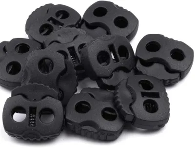 Produktbild von Kordelstopper mit 2 Löchern, 10 Stück für Kordeln bis 4 mm, schwarz, 20x20x5 mm