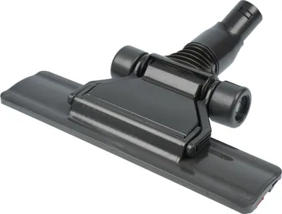 A dark gray vacuum cleaner attachment is shown against a white background.