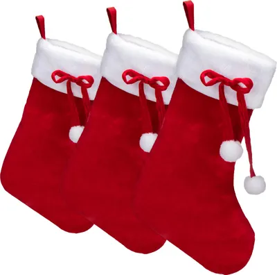 Three red Christmas stockings with white trim and red bows are arranged side-by-side against a white background.