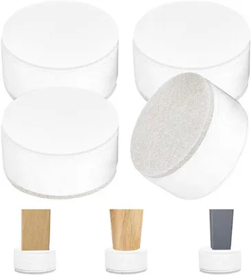Productafbeelding van Een set van 4 meubelverhogers, bestaande uit: 3,2 cm hoge ronde verhogers voor bedframes, meubelverhogerstiften, tafelverhogers en verhogers voor stoelen of banken. Geschikt voor banken, bedden en kasten. Rond en wit.