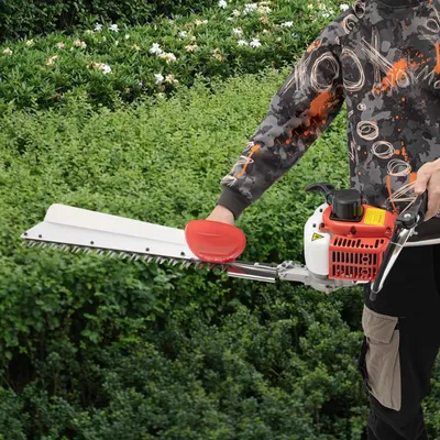 Produktbild von Benzin-Heckenschere/Heckentrimmer - Zweitaktmotor 22,5 cm³ - Messer 70 cm einseitig - Leistung 0,65 kW - Handzugstart - Schultergurt - Rot