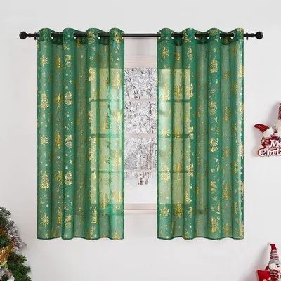 Zdjęcie produktu dla Unyqoos® Zasłony świąteczne, transparentne – zestaw 2 sztuk (140 cm szerokości x 160 cm wysokości), złote motywy świąteczne (choinki, dzwonki, płatki śniegu), 8 metalowych przelotek na zasłonę, przepuszczające światło, zapewniające lekką ochronę przed wzrokiem