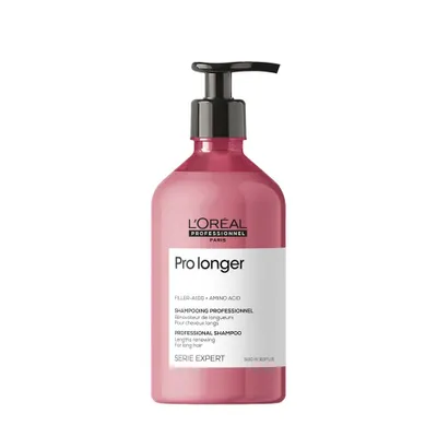 A pink bottle of L'Oréal Professionnel shampoo with a black pump dispenser, set against a white background.
