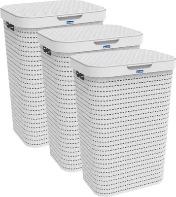 Three white laundry baskets of different sizes are arranged diagonally.