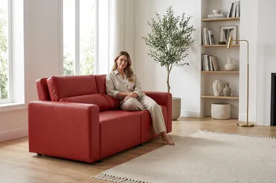 Produktbild von Schlafsofa KOMO Boston – Mit Schlaffunktion & Bettkasten, Kunstleder in Rot, Family Meble, KI-generiertes Bild