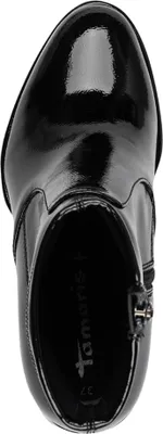 A top-down view of a black patent leather boot.