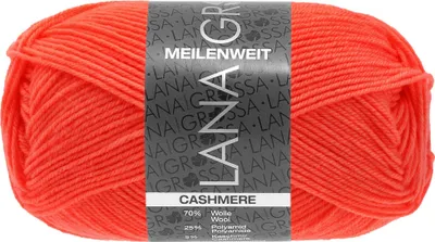 A ball of orange yarn with a label.