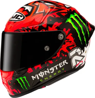 A motorcycle helmet with a red, black, and green design.