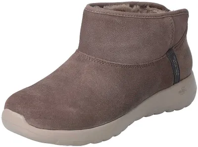 A single brown Skechers boot is shown against a white background.