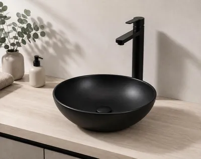 Produktbild von JINDOLI MONOSHAPE Aufsatzwaschbecken oval 41cm, Keramik, Mattschwarz, ohne Überlauf, KI-generiertes Bild