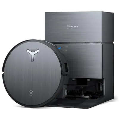 A robotic vacuum cleaner and its charging/emptying station are shown against a white background.