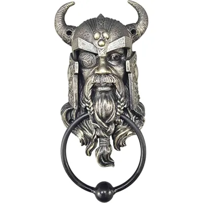 A bronze-colored Viking-themed door knocker with a black ring.