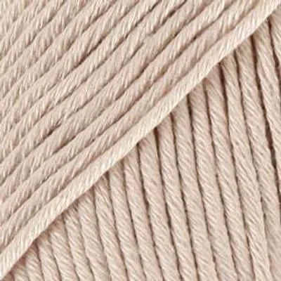 A close-up, diagonal view of beige yarn.