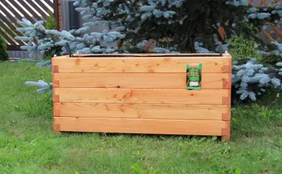 Produktbild von Pflanzkasten 100x50x50cm aus Lärche geschraubt mit Vlies, gerundeten Ecken und Griffen