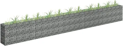 A gabion planter filled with grass.