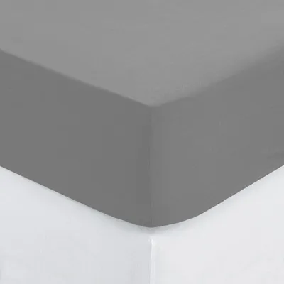 A close-up view of a gray fitted sheet on a white surface.