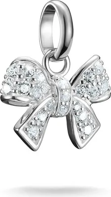 A close-up studio shot of a silver bow-shaped charm encrusted with small clear stones, suspended from a silver bail.