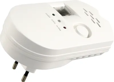 A white gas alarm device plugged into an electrical outlet.