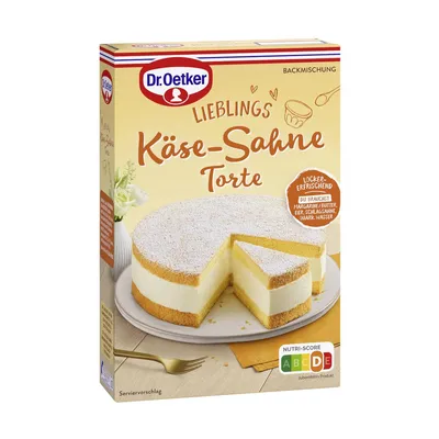 A product shot of a Dr. Oetker Käse Sahne Torte baking mix box, with a picture of the finished cake on the front.