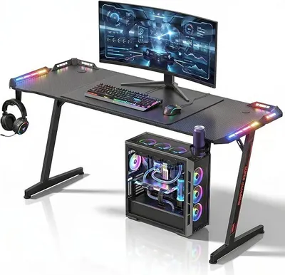 Image de Bureau de jeu avec éclairage LED, dimensions 160x60 cm. Bureau ergonomique pour ordinateur, avec porte-gobelets, support pour casque, surface en fibre de carbone, idéal pour le streaming, de couleur noire