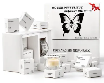 Immagine prodotto di Set regalo di 12 candele profumate con messaggio, realizzate con cera di soia, ideali per le donne