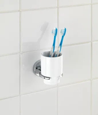 Zdjęcie produktu dla Pojemnik na szczoteczki do zębów WENKO Vacuum-Loc® Capri, mocowanie bez wiercenia, błyszczące srebro