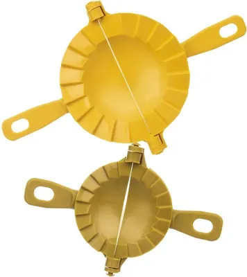 Two yellow dumpling molds are shown against a white background.