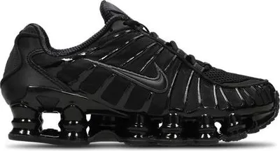 A studio shot of a black Nike Shox TL sneaker.