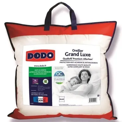 A pillow in its packaging, with a woman and child depicted on the packaging.