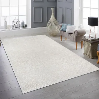 Zdjęcie produktu dla Nowoczesny dywan z delikatną fakturą i eleganckim wzorem w kremowym kolorze Rozmiar - 120 x 170 cm