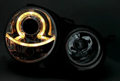 Rückansicht von Für VW Polo 9N 2001-06/2005 Angel Eyes Scheinwerfer Schwarz Links + Rechts mit Fokus auf Befestigungselemente