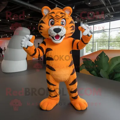 Produktbild von Orangefarbener REDBROKOLY Tiger Maskottchen Kostüm charakter bekleidet mit einem Overall und Fußpolstern