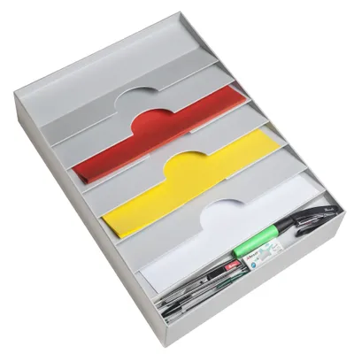 A desk organizer with multiple compartments, containing colored folders and pens.