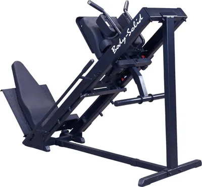 A black Body-Solid GLPH1100B Kraftstation for leg press and hack squat exercises is shown against a white background.