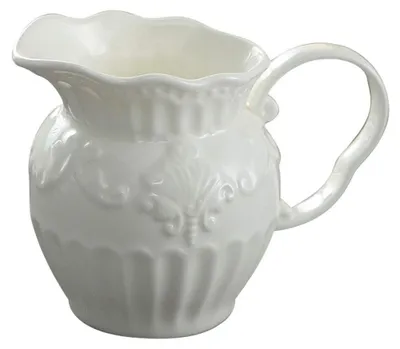 Imagen del producto de Jarra de leche de porcelana con asa elegante