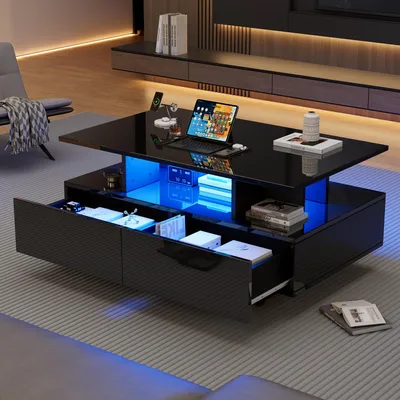 A modern living room with a black coffee table featuring LED lighting and storage drawers.