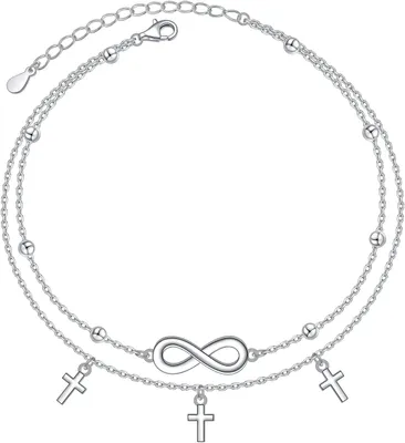 Image de Cheville en argent, réglable, avec un petit pendentif en forme de croix, des perles, et un design multicouche, idéale pour la plage
