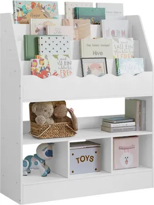 A white bookshelf filled with children's books and toys.