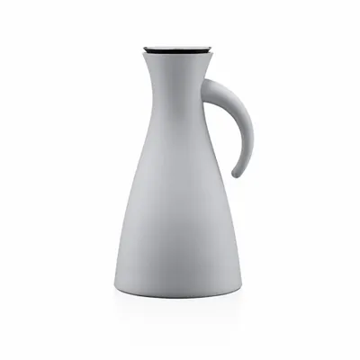 A light gray Eva Solo insulated carafe with a handle and lid, isolated on a white background.