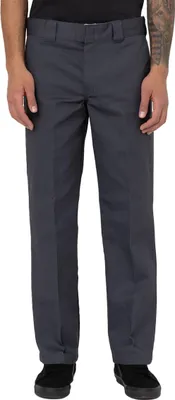 A person is wearing a pair of charcoal grey Dickies work pants.