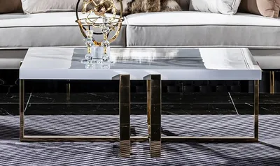 Produktbild von Casa Padrino Luxus Couchtisch Weiß / Gold 120 x 80 x H. 45 cm - Rechteckiger Wohnzimmertisch mit Massivholz Tischplatte und Metallbeinen - Wohnzimmer Möbel - Luxus Möbel - Hotel Möbel