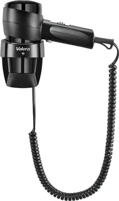 A black wall-mounted hairdryer with a coiled cord.
