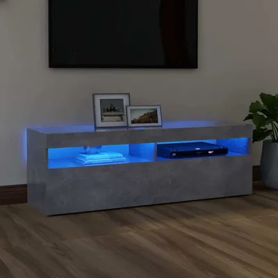 A modern TV stand with blue LED lighting in a living room setting.