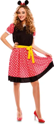A woman is posing in a Minnie Mouse costume against a white background.