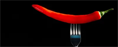 Produktbild von Wallario Poster - Rauchende Chili-Schote an einer Gabel, Kunstdruck Größe: 50 x 125 cm
