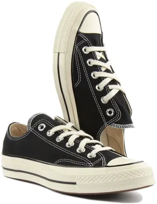 A pair of black Converse Chuck 70 low-top sneakers.