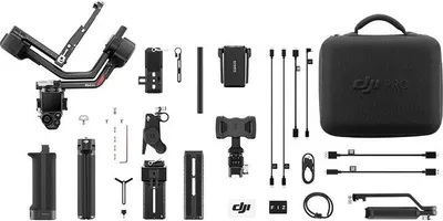 A flat lay of a camera gimbal and its accessories, neatly arranged on a white background.