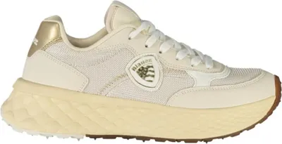 Produktbild von Elegante beige Sportschuhe mit goldenen Details und Druckmotiv.