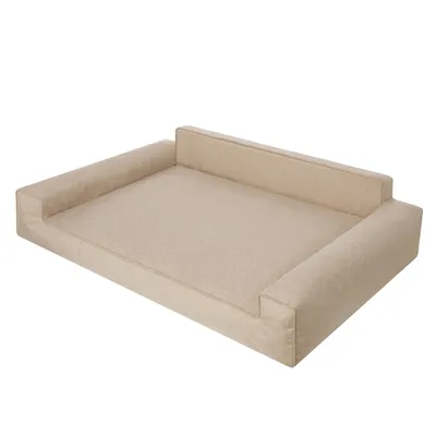 A dog bed with raised sides on a white background.