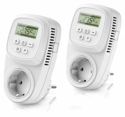 Two white digital plug-in thermostats are shown side-by-side against a white background.